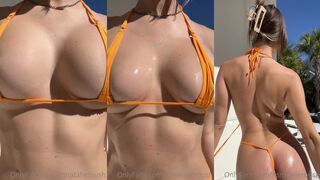 Natalie Roush orange slingkini pussy show